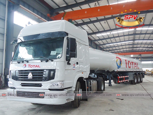 Front Left View of Sinotruk Tractor and Fuel Tank Semi-trailer (36,000 liters) for Gambia "TOTAL"