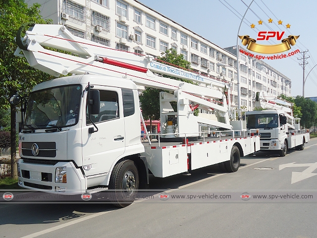 2 units of aerial platfrom trucks are waxed, ready for shipment