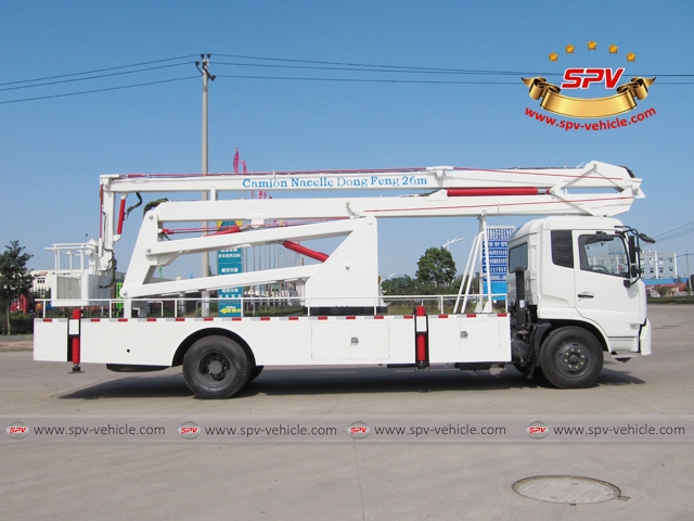 Side view of 2 units of aerial platfrom trucks are waxed, ready for shipment